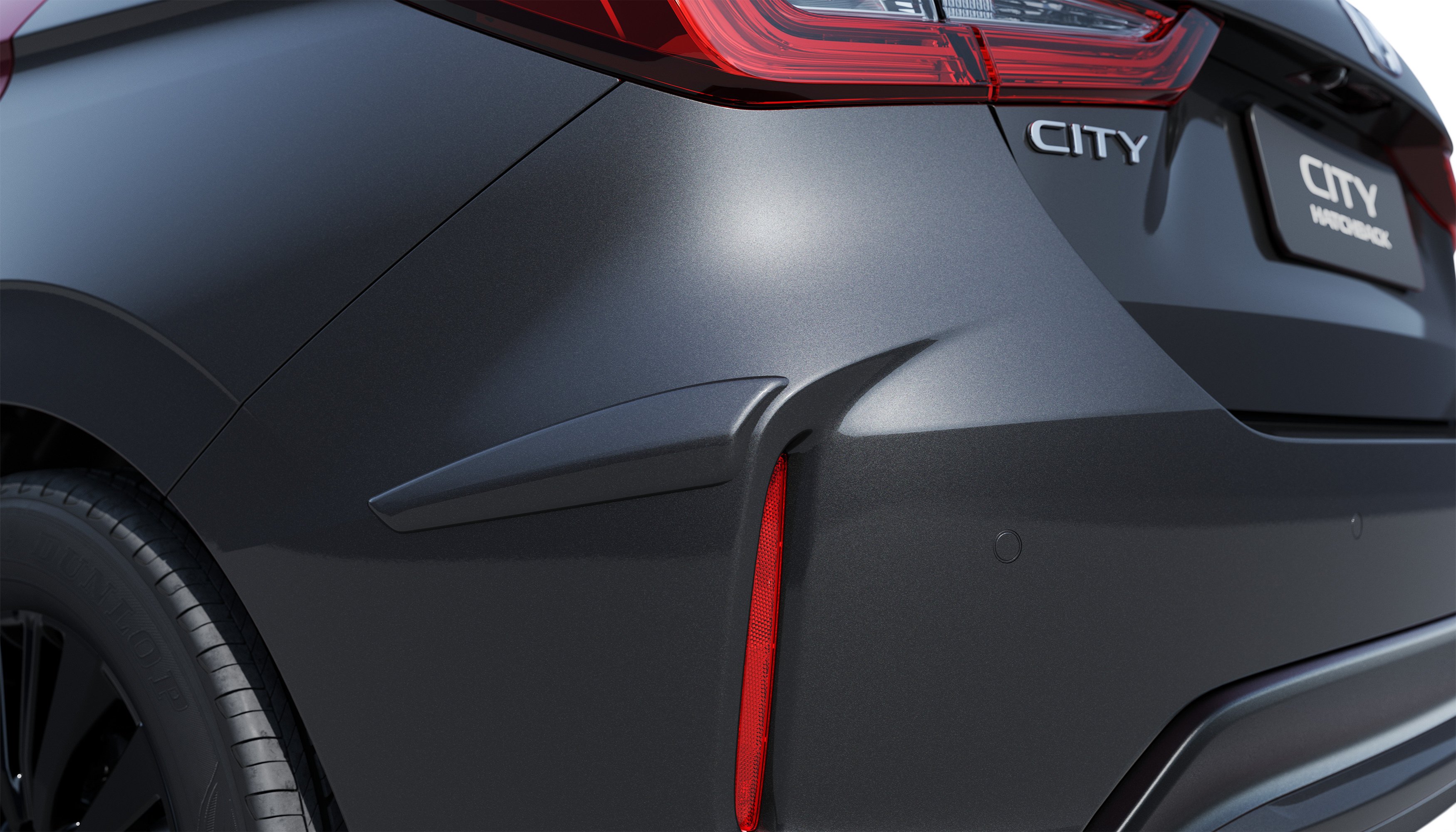 PROTETOR LATERAL DE PARA-CHOQUE TRASEIRO (CITY HATCH) - Cinza basalto metálico