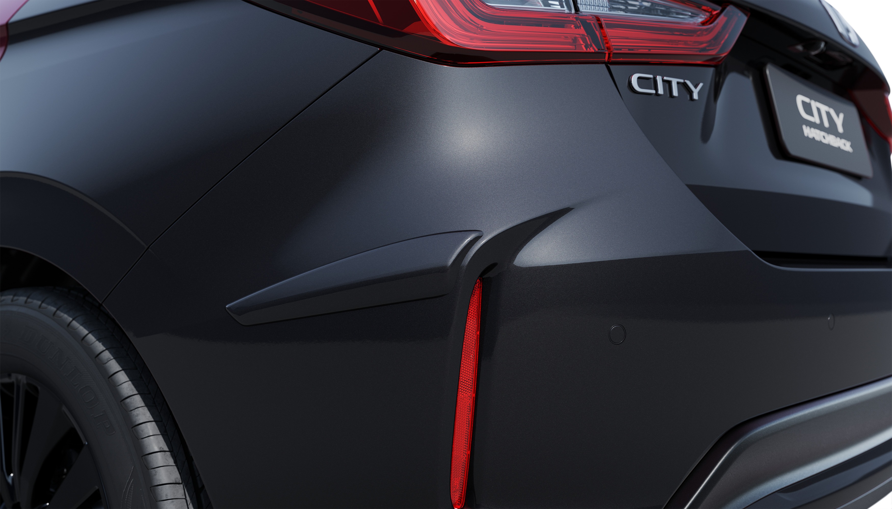 PROTETOR LATERAL DE PARA-CHOQUE TRASEIRO (CITY HATCH) - Preto cristal perolizado