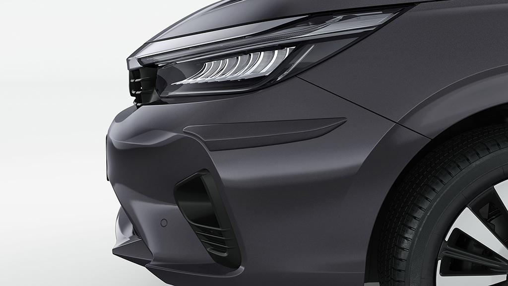 PROTETOR LATERAL DE PARA-CHOQUE FRONTAL (CITY HATCH) - Cinza basalto metálico