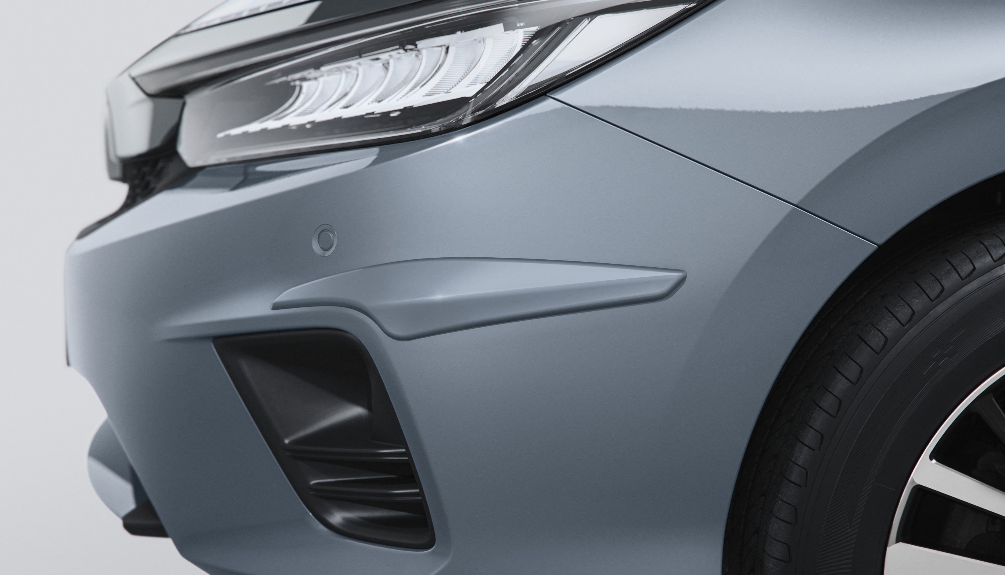 PROTETOR LATERAL DE PARA-CHOQUE FRONTAL (CITY HATCH) - Cinza grafeno perolizado