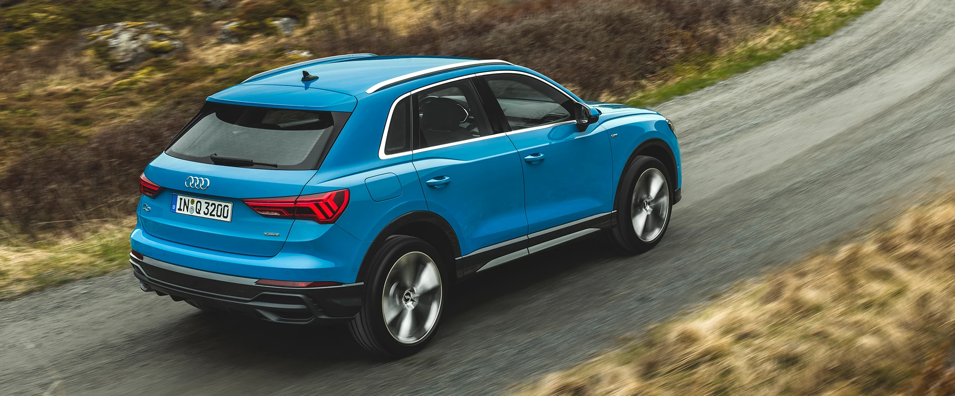 Modelo Audi Q3 SUV na pista