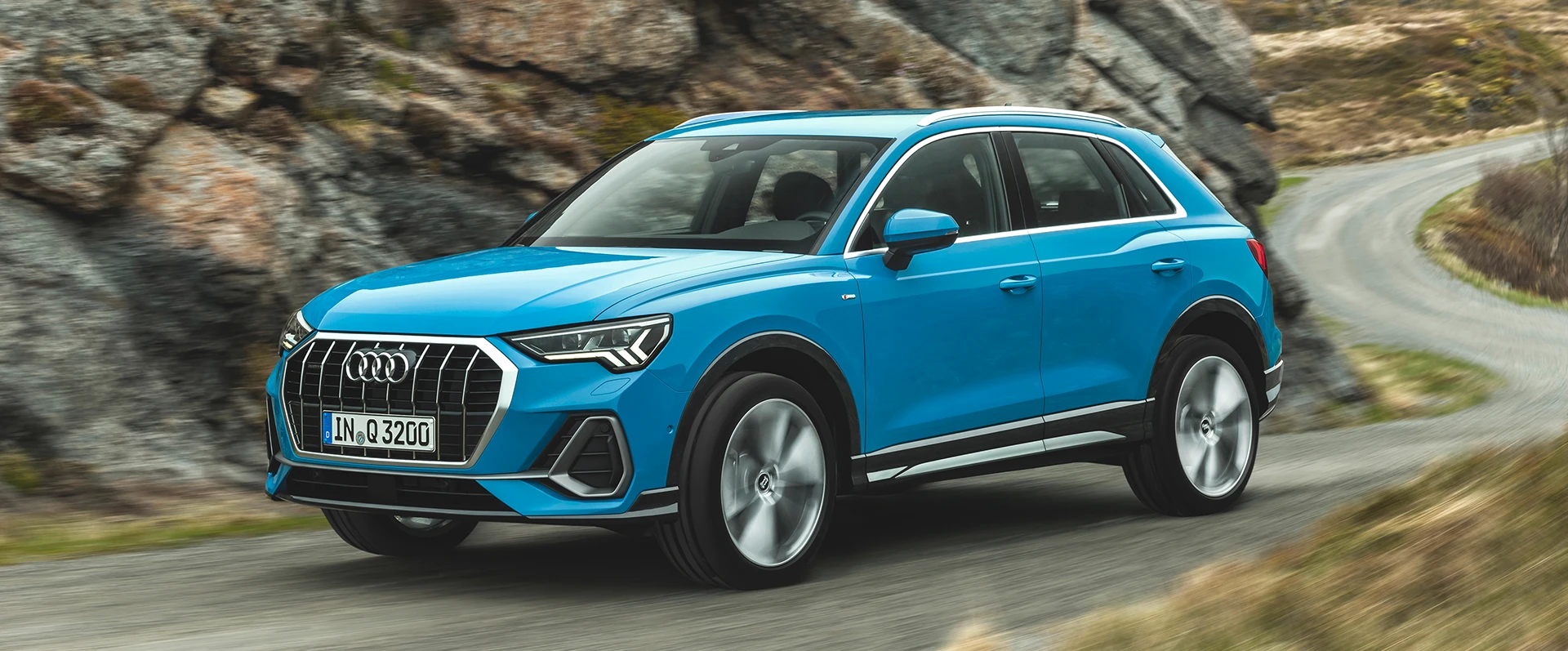 Modelo Audi Q3 SUV na pista